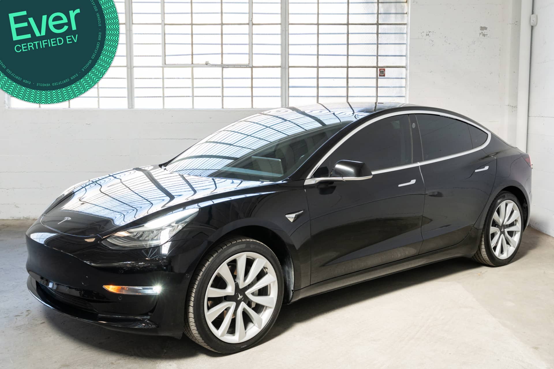 EverCars Co. featured vehicle's image for Tesla Model 3 -  Standard Range Plus on EverCars Co.