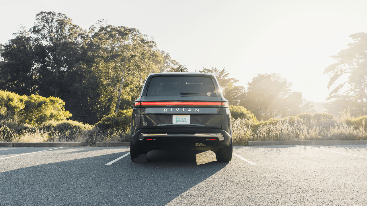 A Rivian R1S sitting underneath the California sun