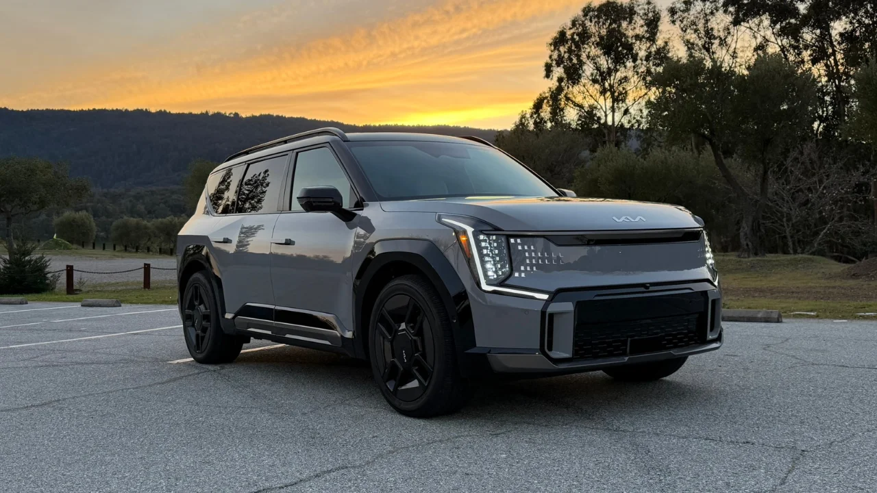 Kia EV9 sitting beneath the California sunset