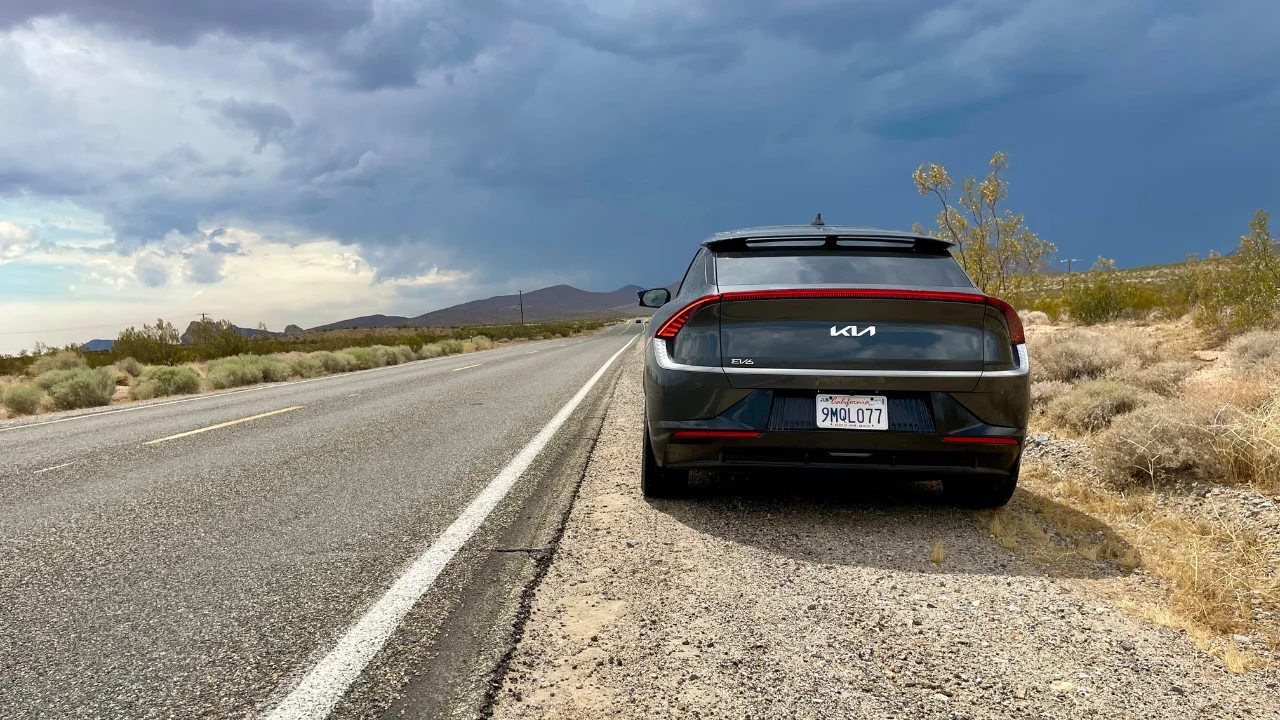 Kia EV6 gazing into a desert storm